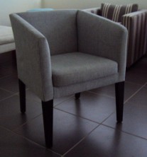Zac Single Tub Chair. Square Back. Stained Timber Legs. Any Fabric